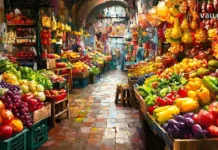 გემოვნებიანი თავგადასავალი: კულინარიული მოგზაურობის ხელოვნება და ბიუჯეტი Authentic European food market with fresh local produce and street food stalls.