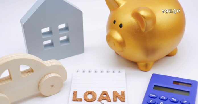 Calculator, notebook, and money representing responsible borrowing and fast loans in Georgia.